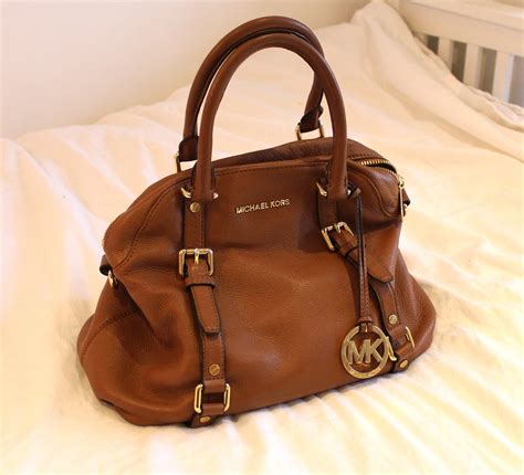 older michael kors purses|used michael kors handbags.